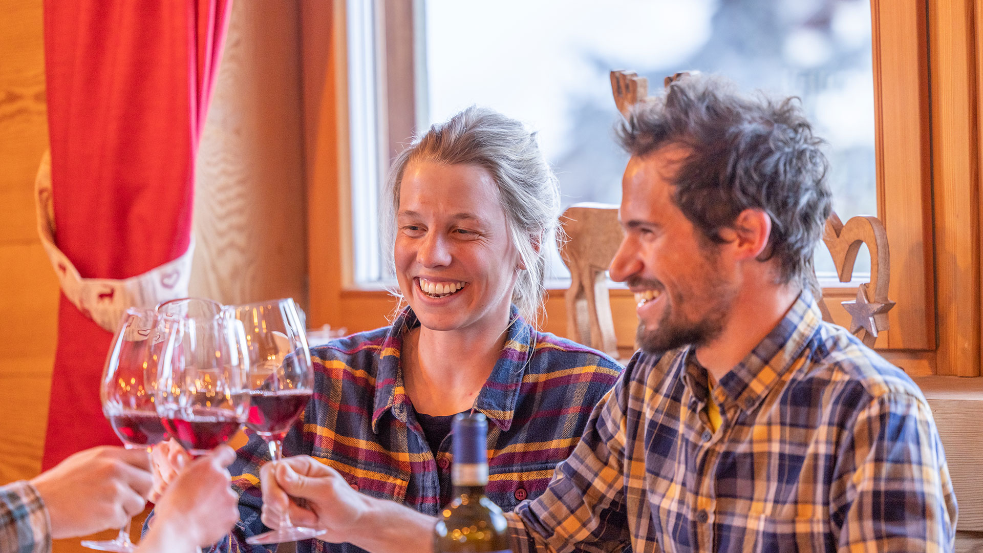 Eating a typical dish with good wine and beer at the restaurant of the hotel Alegra in Livigno